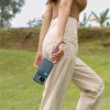 Uniq Coehl Laurel Handstrap uniwersalnysznurek do telefonu na reke czarny/black - (UNIQ-LAUREL-HMBLK)